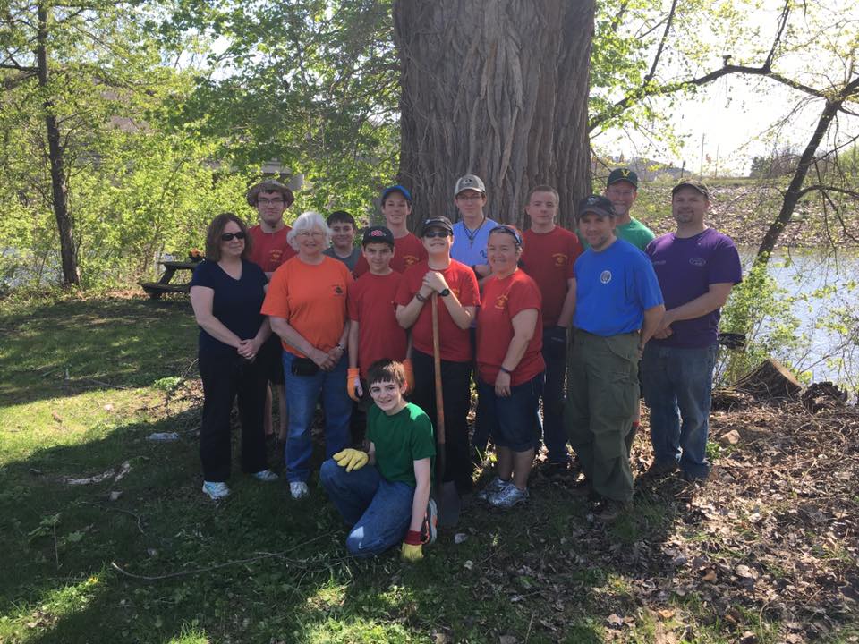 Linda Goodman (orange) with the Boy Scout Troop